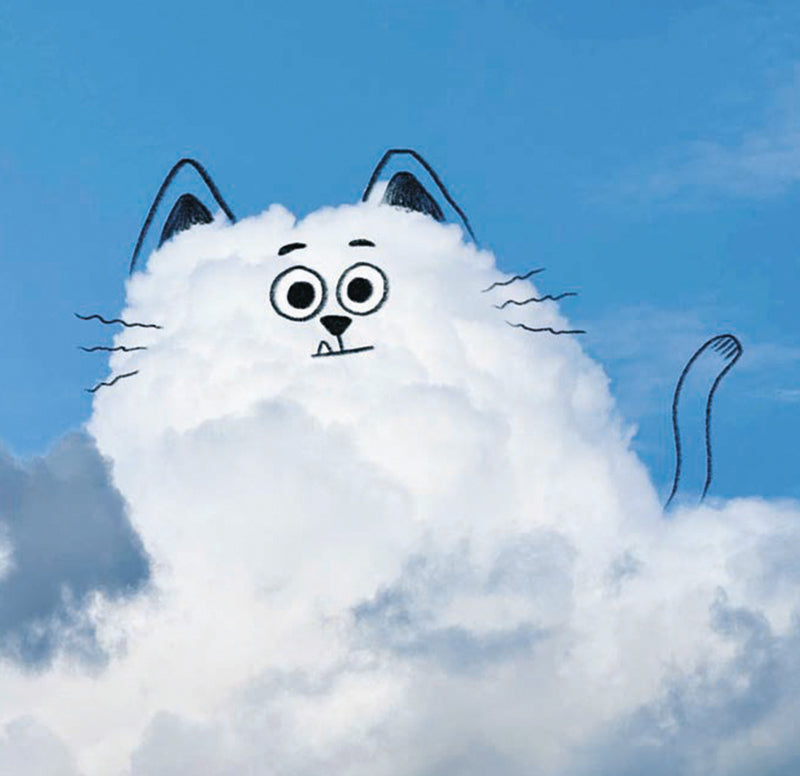 Cat head cloud with a blue sky background